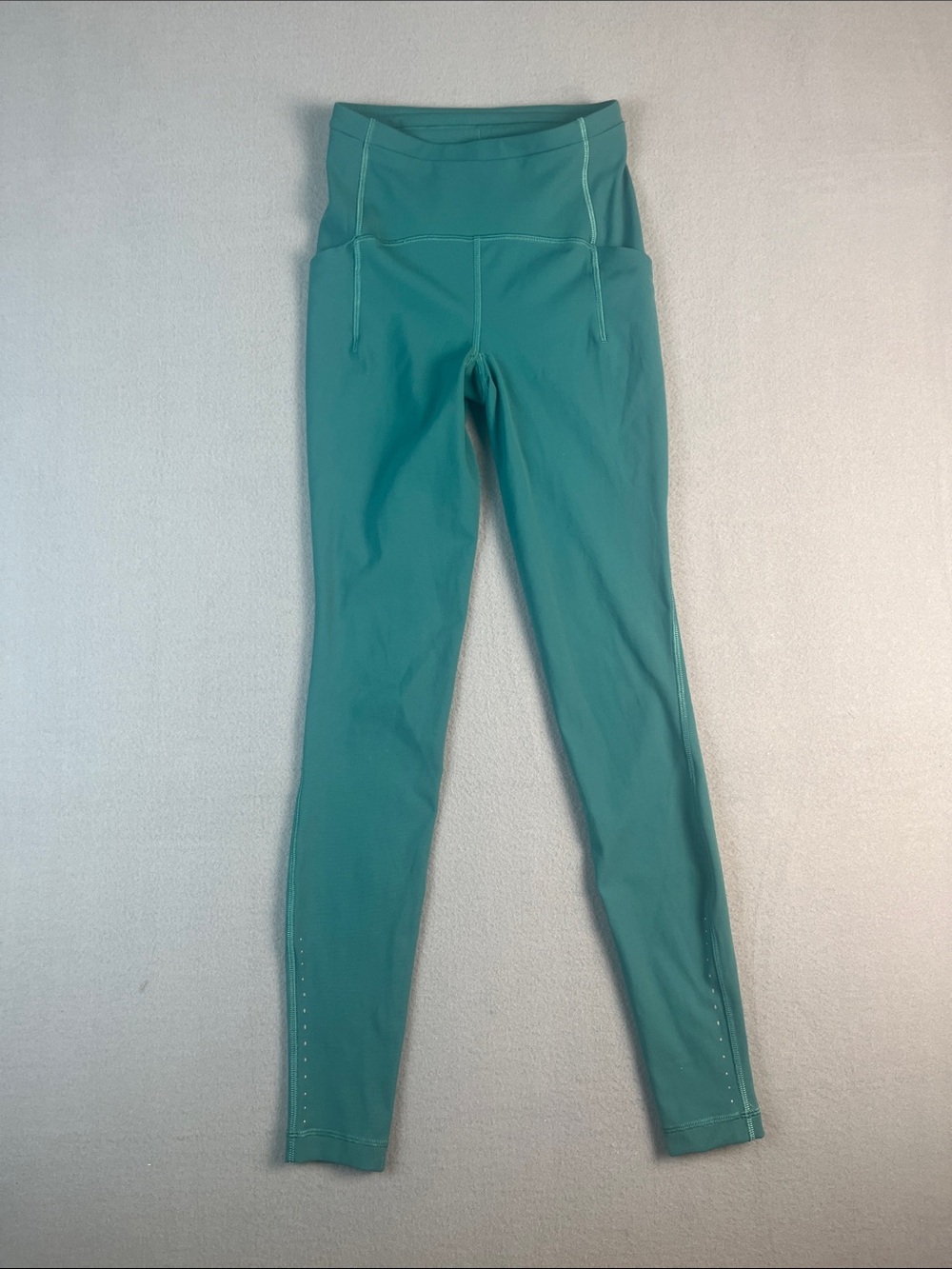 Lululemon Swift Speed Leggings in teal green
Size: 2